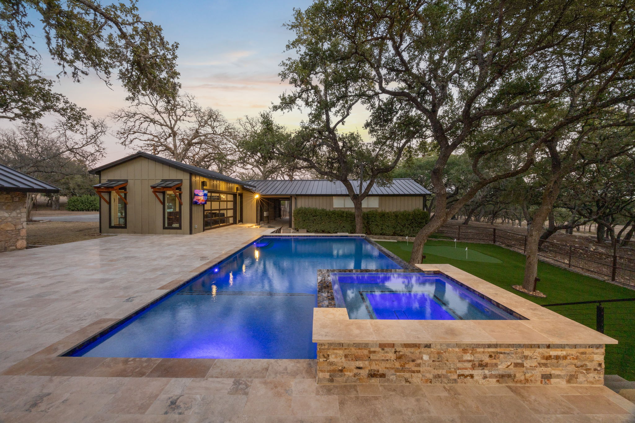Evening pool scene with Hill Country backdrop